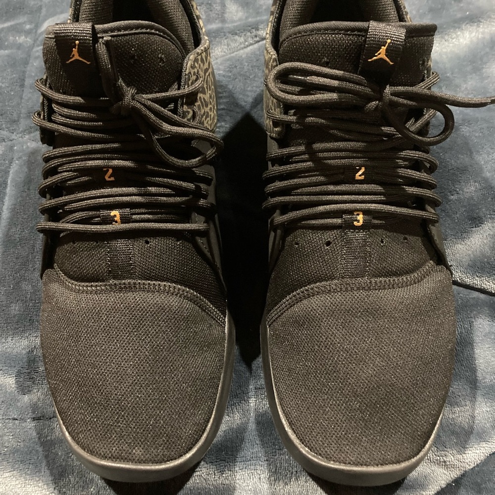 Nike Air Jordan’s black with some gold metallic
